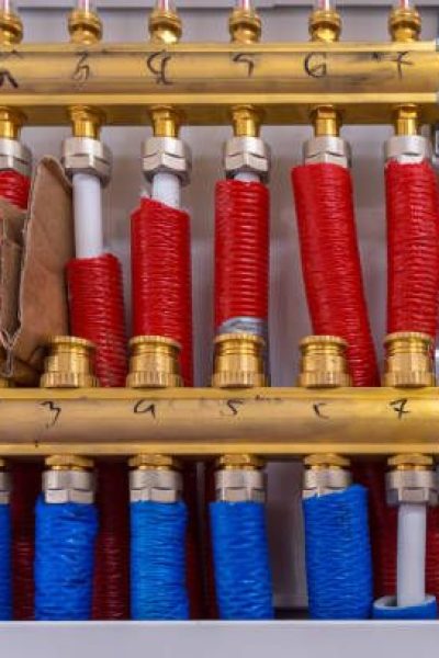 Water pipes of central heating system in boiler room